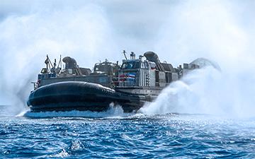 Military hovercraft at sea